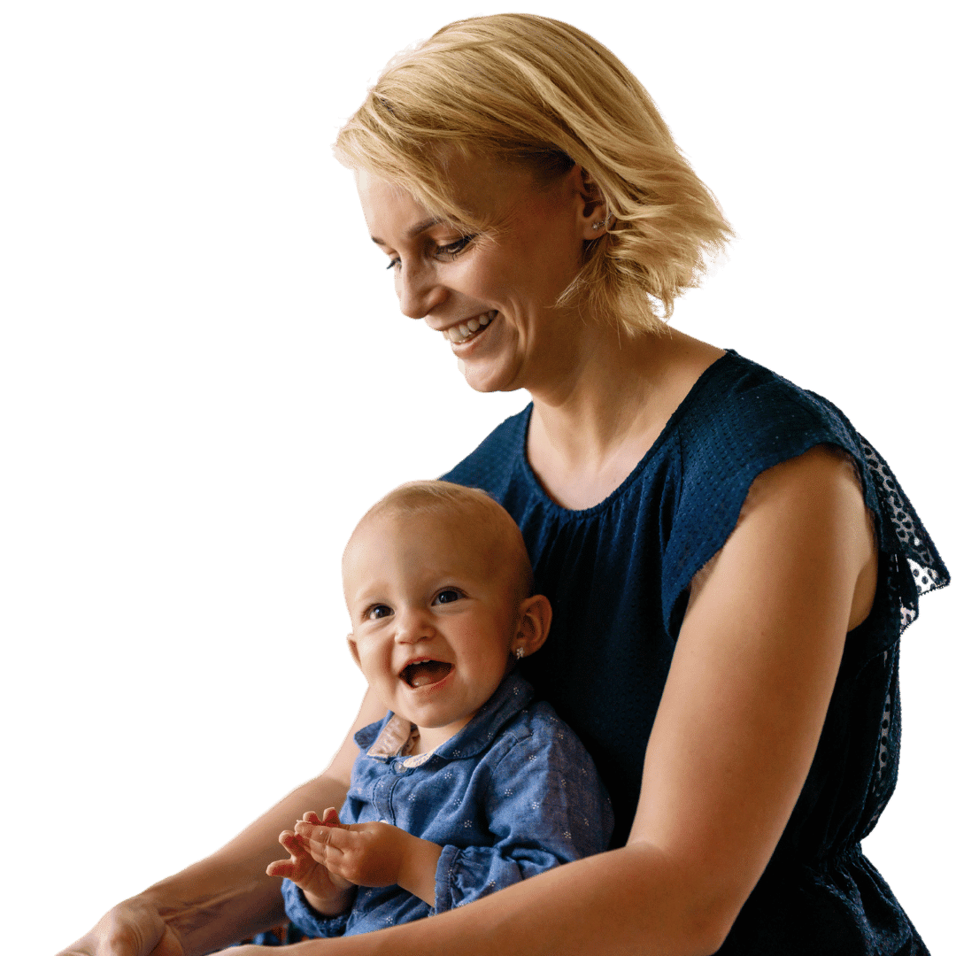 Childcare educator playing with child